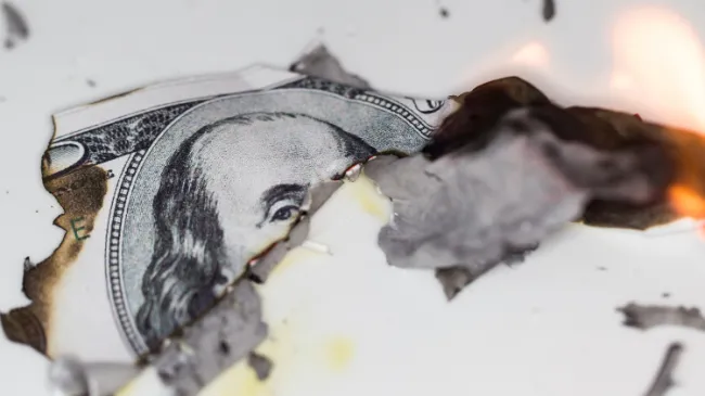 burning dollar bill